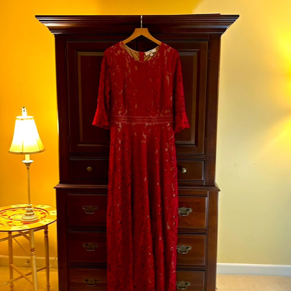 Long red lace size XL gown.  Beautiful and flattering.